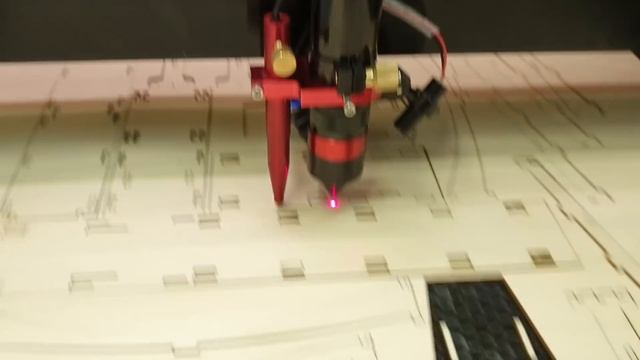 China 100 W Laser at work - real time cutting of plywood 3D model of Suriname bridge