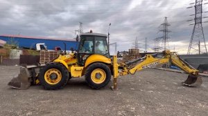 Экскаватор-погрузчик New Holland B115, 2007год