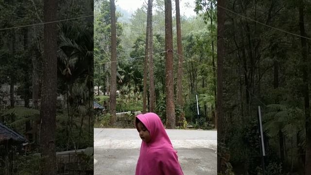 Before entering a forest in Central Java and a beautiful little girl enjoying the drizzle смотреть онлайн