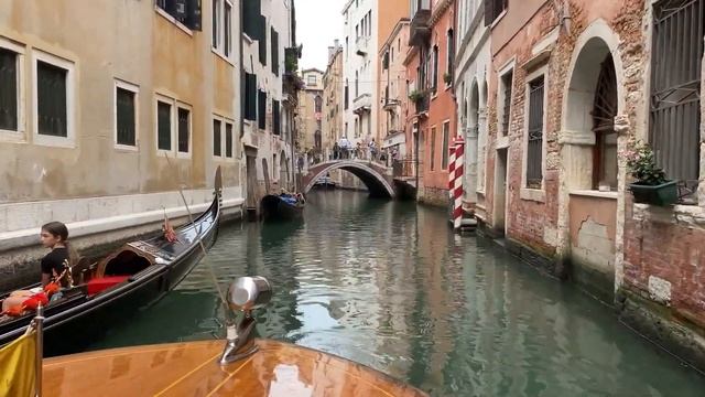Canals Of Venice. Sightseeing From The Sailing Boat. Gondolas