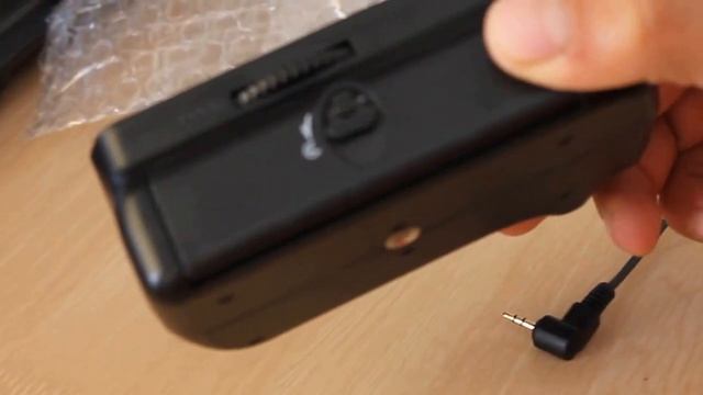 MeiKe Battery Grip for Canon 1100D Rebel T3 (unpacking) смотреть онлайн