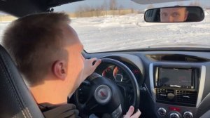 На субарике боком по льду. За рулем Subaru Sti с тренером