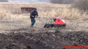 Мотобуксировщик - пробую бороновать землю ?