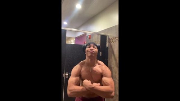 Young Boy flexing his huge chest : Jamar