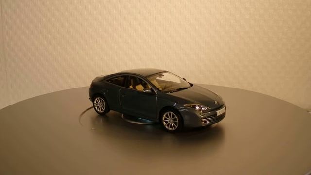 Renault Laguna Coupé (2010) 1/43 смотреть онлайн