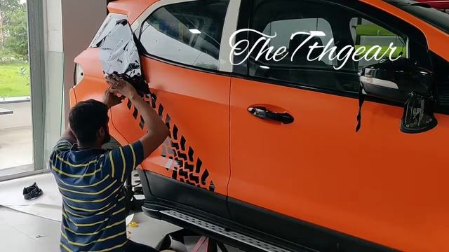 Tyre pattern decals on matte orange wrap. смотреть онлайн