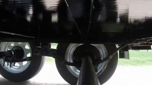 Двухосная рессорная система подвески прицепа с коромыслом