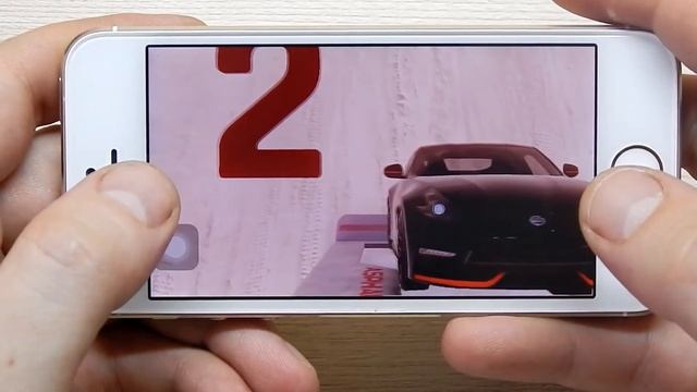 Пробуем поиграть в Асвальт 9 на IPhone 5s смотреть онлайн