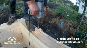 Сверление отверстий под нагель при строительстве дома из бруса