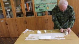 Инструкция по изготовлению ватно-марлевой повязки.