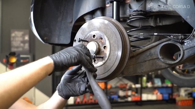 How to change rear brake drum on OPEL CORSA D [TUTORIAL AUTODOC] смотреть онлайн