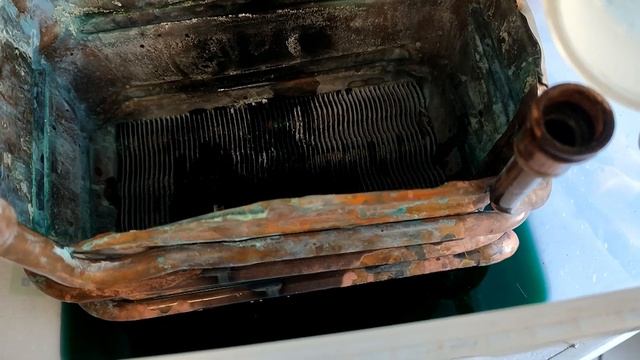 Промывка теплообменника газового водонагревателя JUNKERS WR10, Bosch WR10. смотреть онлайн