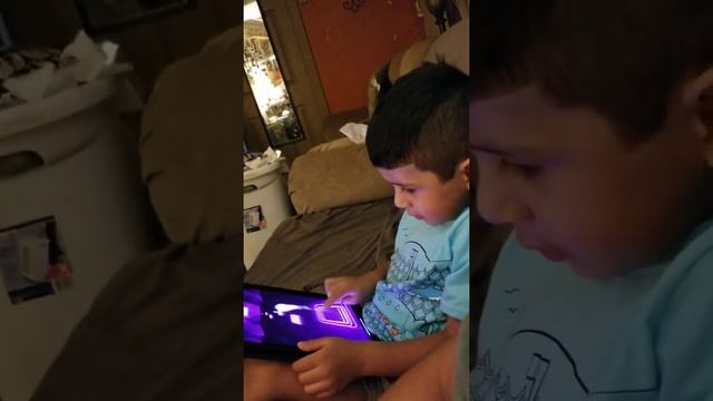 My 3yr old grandson playing games on his iPad смотреть онлайн
