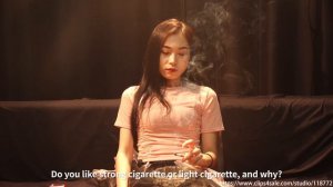 Smoking asian woman