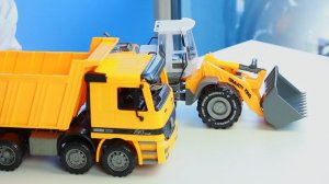 Открываем игрушки машинки. Погрузчик и грузовик самосвал. МанкиИгрушки