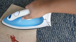 Как удалить воск с одежды