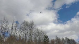 Вертолёт летит к Больнице.
