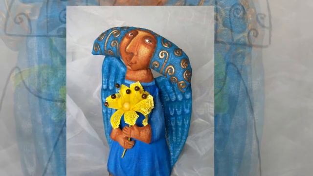 Бирюзовый Ангел с солнечным цветком... смотреть онлайн