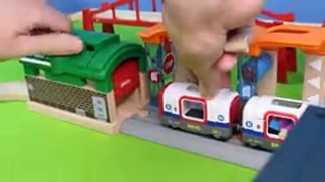 Trains Run Through A Wooden City