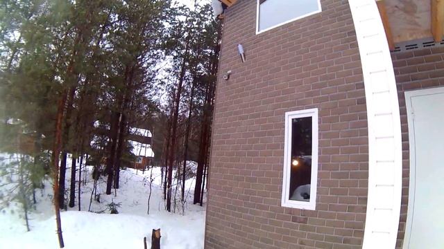 Каркасный дом зимой