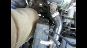 Замена ролика натяжителя ремня генератора на Opel Astra G