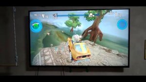 Как подпрыгнуть в Beach Buggy Racing на телевизоре?