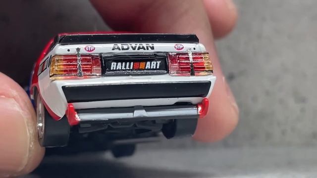 1/64 Tarmac Works Mitsubishi Starion JTC1987 смотреть онлайн