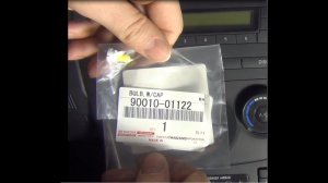 Замена лампочки подсветки переключателя печки передней панели на автомобиле Тойота Королла Е150