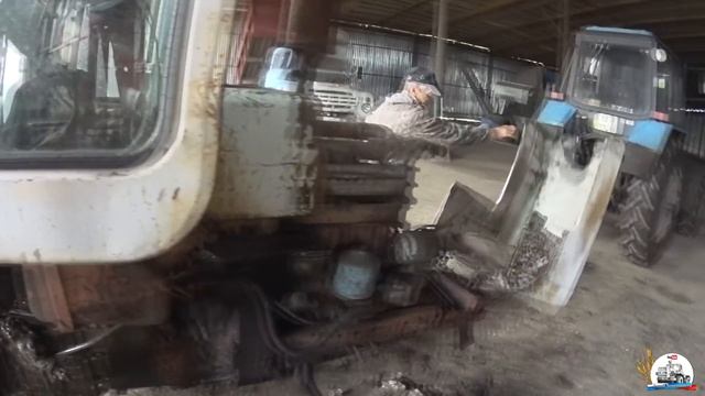 Буксируем на МТЗ-1221 трактор Т-70С и демонтируем с него кабину под "офис" весовой. смотреть онлайн