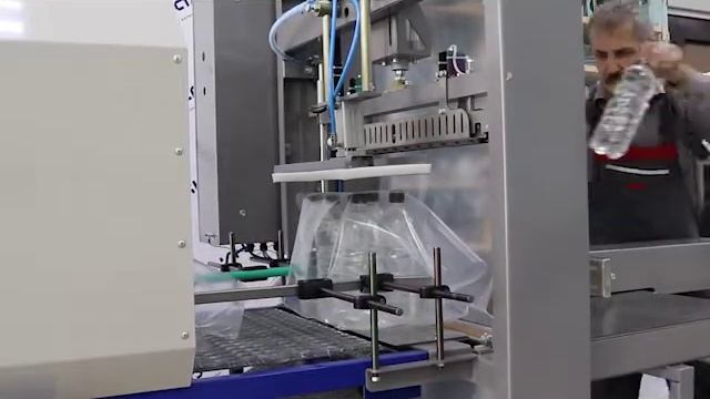 Упаковочное оборудование: Групповая упаковка бутылок 