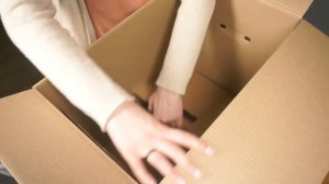 Как правильно собрать картонную коробку для переезда.