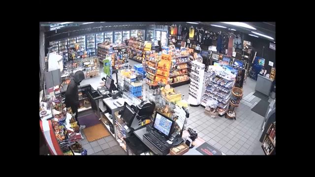 Masked men rob store at gunpoint, strike clerk смотреть онлайн
