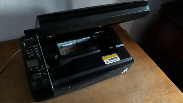 EPSON STYLUS TX210 смотреть онлайн