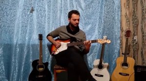 Электрогитара Фабио, и комбоусилитель Фабио 10W, обзор возможностей, парень круто играет на гитаре