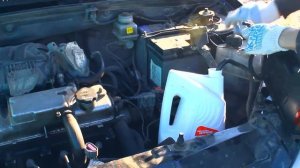 Сливаю 2 литра антифриза на Калине при помощи компрессора