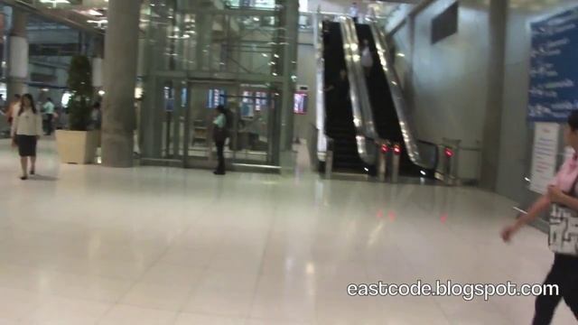 Downstair to Gate 8 and taxi stand at Bangkok Suvarnabhumi airport BKK смотреть онлайн