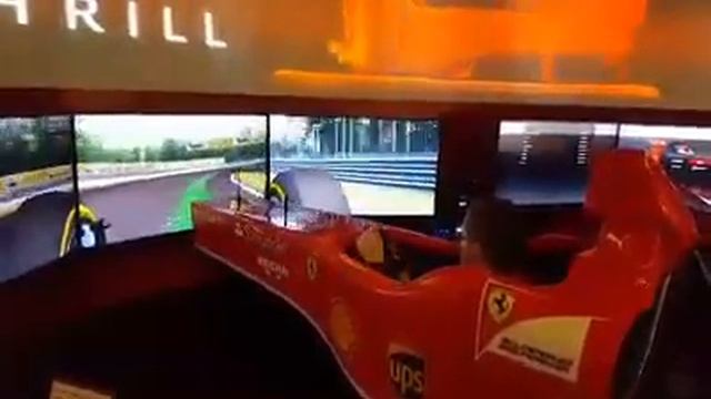 Ferrari F1 Simulator in the Ferrari Store in Milano. смотреть онлайн