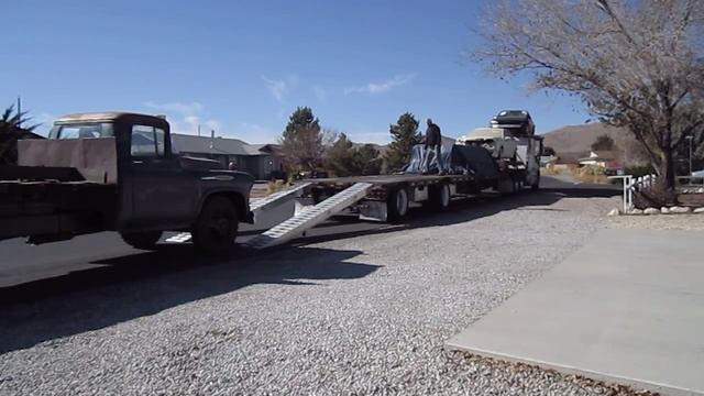 1957 Chevy 4400 Dump Truck driving onto flatbed trailer going to Port of Los Angeles смотреть онлайн