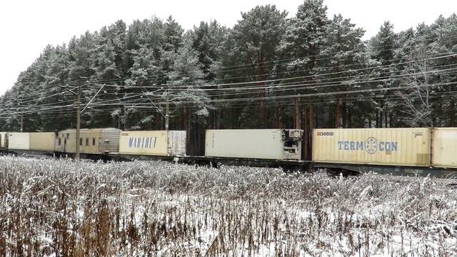 «Зимняя дорога» 2ЭС6-027 «Синара» с грузовым поездом смотреть онлайн