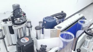 AU KP 38  Автоматическая этикетировочная машина для круглых бутылок