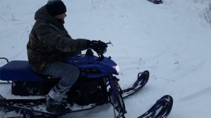 Снегоход Динго 150 въезд в крутую гору.