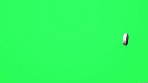 ФУТАЖ: таблетка катится (зеленый фон)