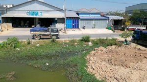 Working on Muddy AreaR oad Construction By Dozer Komatsu D20P