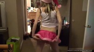 Cute Pregnant Girl showing her Christmas Outfit