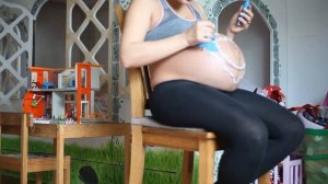 Рисунок на животе беременной