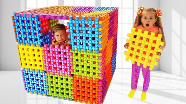 Diana and Roma Playing with Toy Blocks