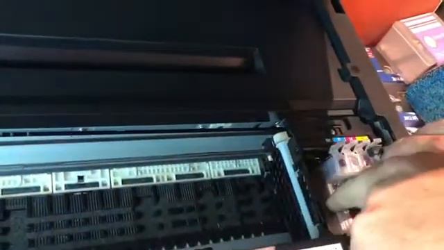 Cleaning a blockage from an Epson WF-7710 смотреть онлайн