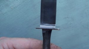 Сувель и кап на рукояти ножа.