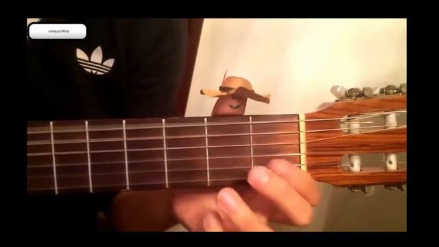 UN POUCE SOURIANT JOUE DE LA GUITARE смотреть онлайн