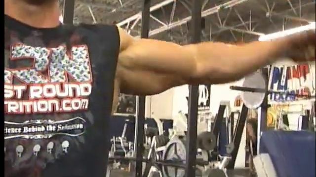 Bodybuilder Jimmy McDowell Poses And Measures Biceps And Triceps